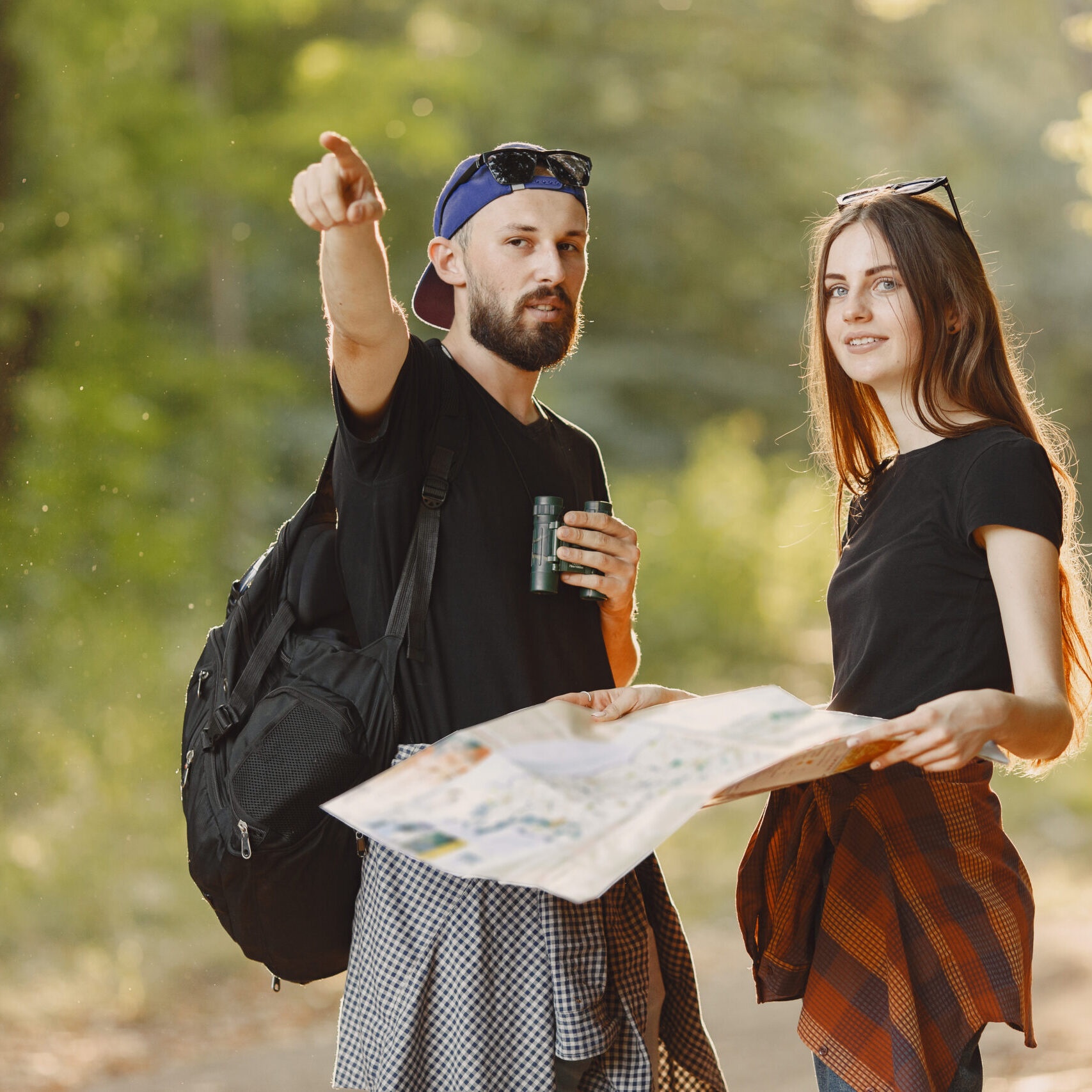 Adventure, travel, tourism, hike and people concept. Couple in a forest.